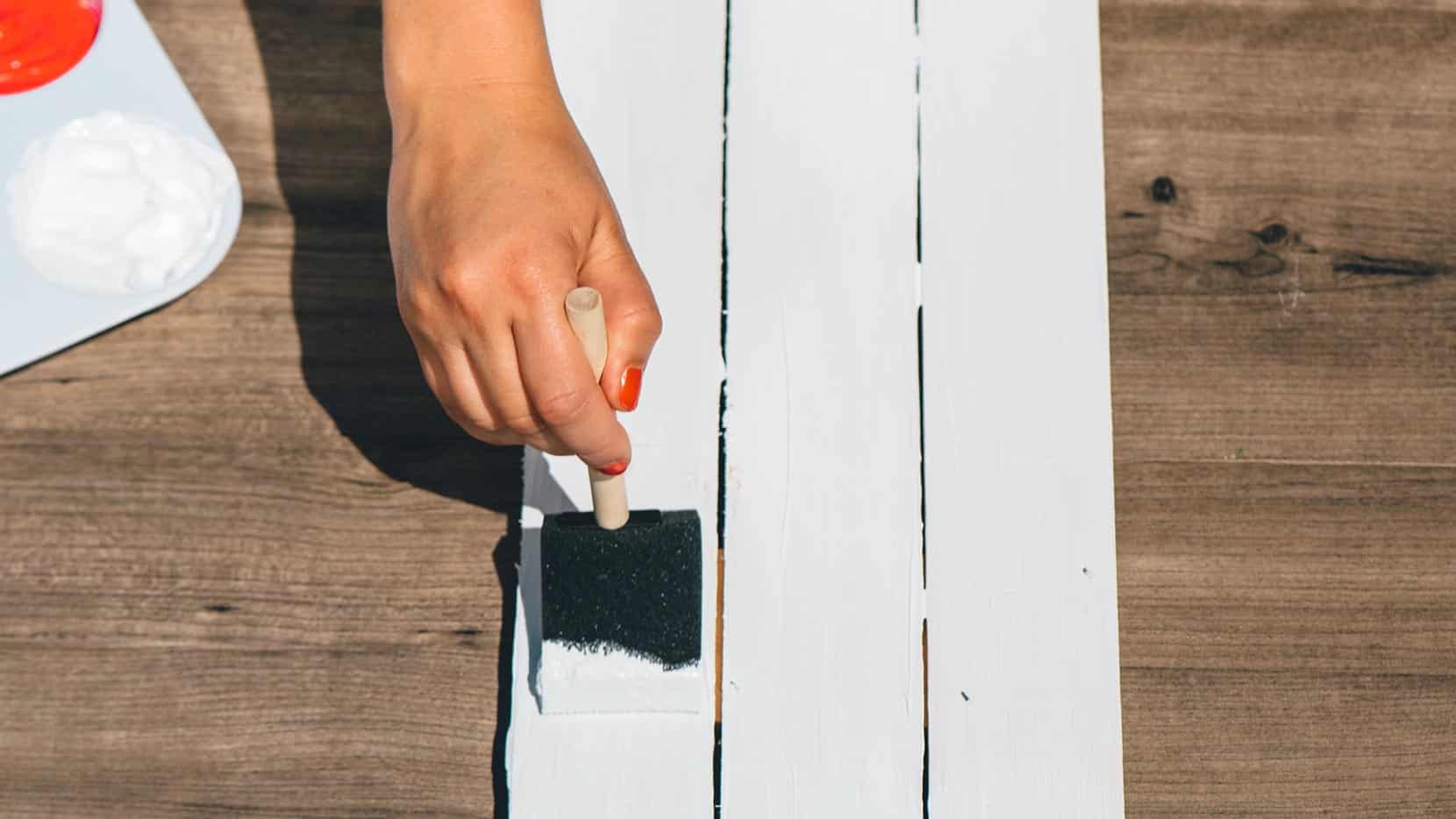 Paint wooden background and allow to dry before before mounting lids