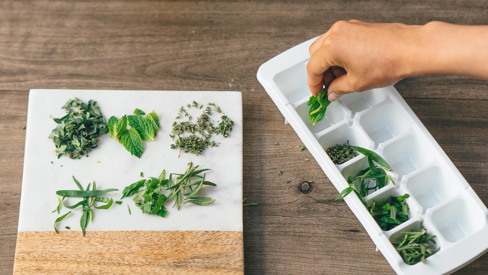 Add herbs to ice cube tray