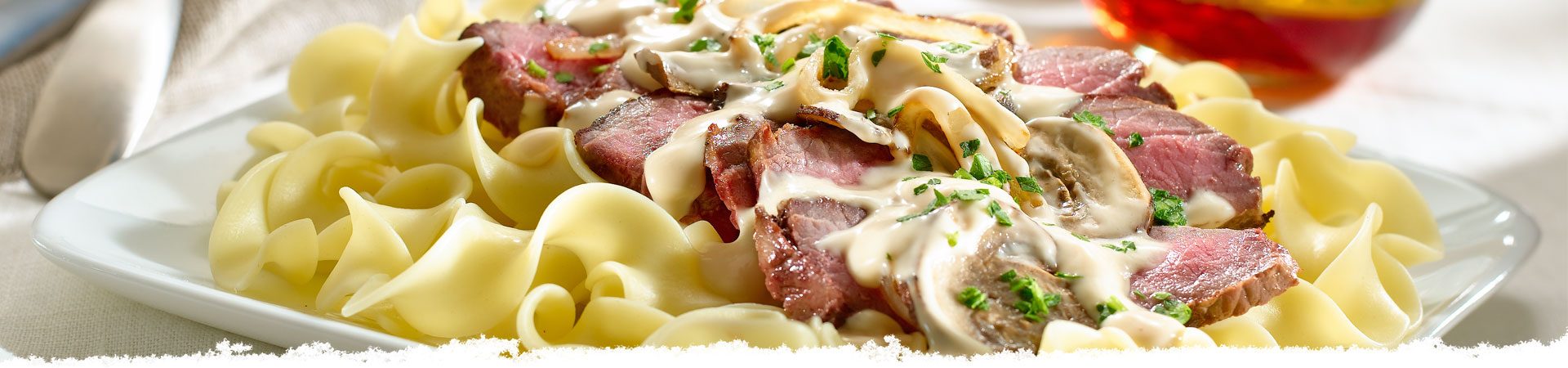 Sliced Sirloin with Stroganoff Sauce