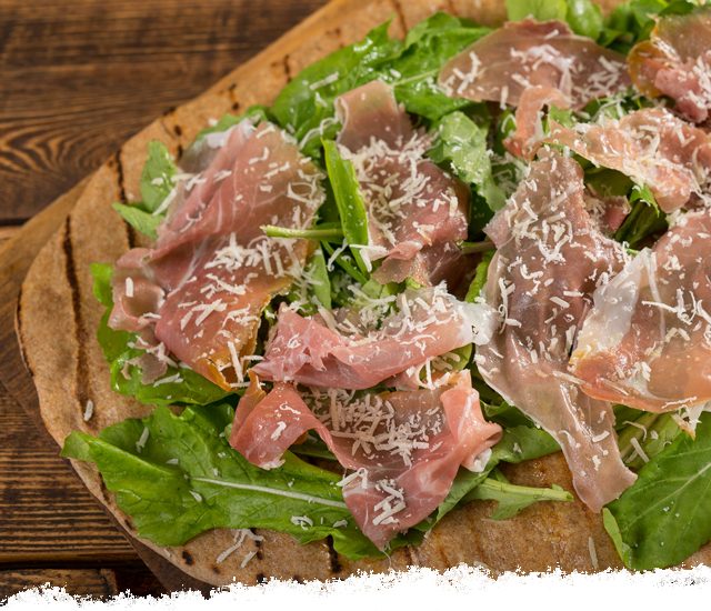 Perfectly Grilled Pizza with Prosciutto and Arugula