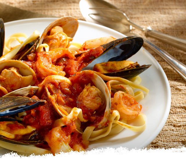 Sicilian Fish Stew Over Fettuccine