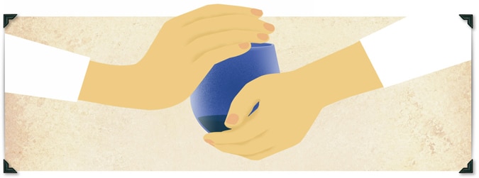 Warm the oil by cupping your hands around and over the top of the glass, and slowly rotate it so the oil sticks to the sides.