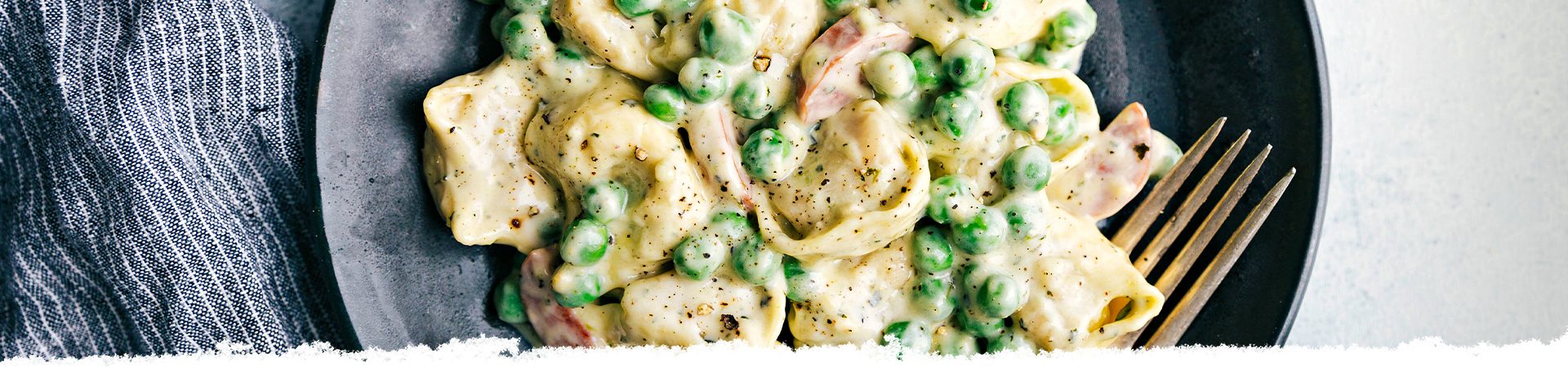 Alfredo Pesto Tortellini with Sausage